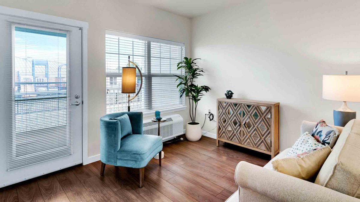 A furnished bedroom in a Camellia Gardens apartment