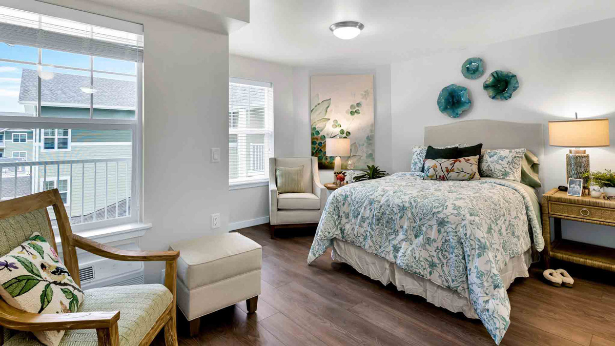 A furnished bedroom in a Camellia Gardens apartment